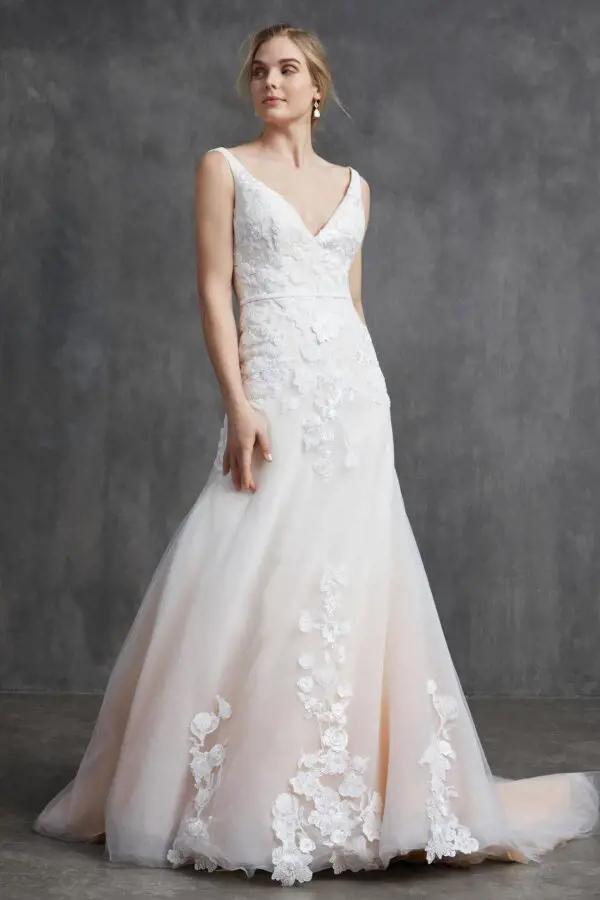 LUCILLE Add a hint of color with this classic v-neck wedding dress in blush ombre or keep it traditional in all ivory. Whether you choose the traditional ivory or the ombre tulle wedding dress, the fit-to-flare silhouette of this spring wedding gown is romantic and elegant in all the right ways. SIZE: 0-24 FABRIC: Tulle and embroidery SILHOUETTE: Fit-to-Flare NECKLINE: V neck WAIST: No waist, princess seams COLOR: Photographed in Blush Ombre, also available in Ivory | Marilyn Collection by Kelly Faetanini
